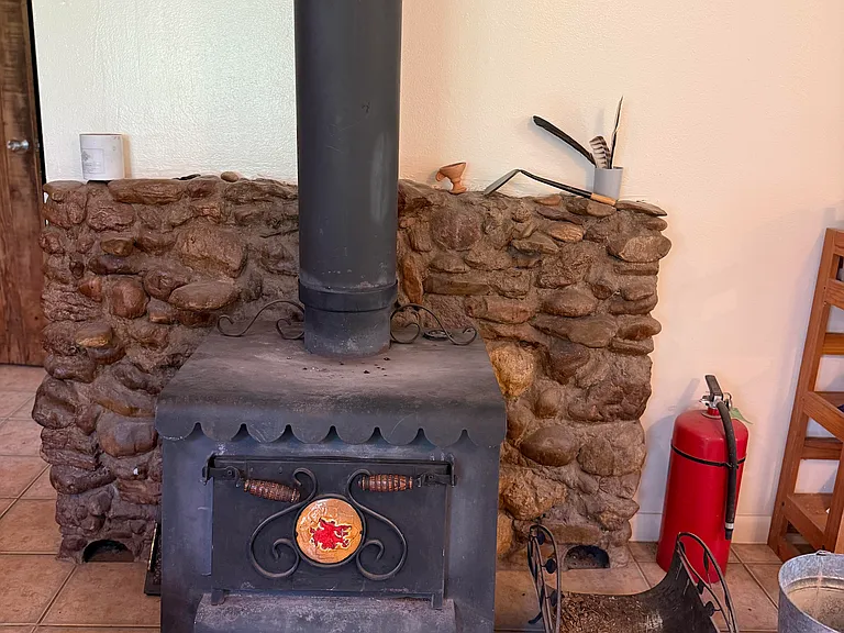 Our trusty wood stove. The HVAC system will circulate the heat throughout the house.