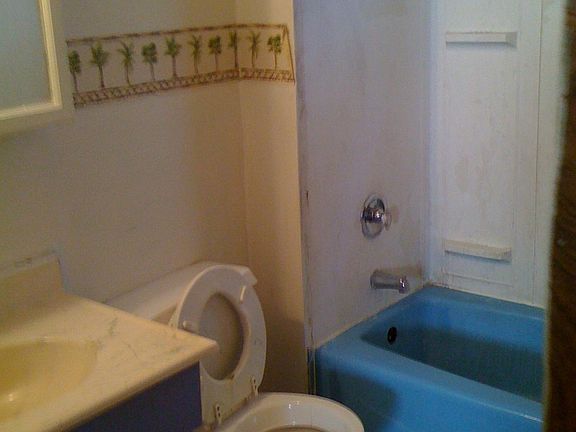 Bath with shower