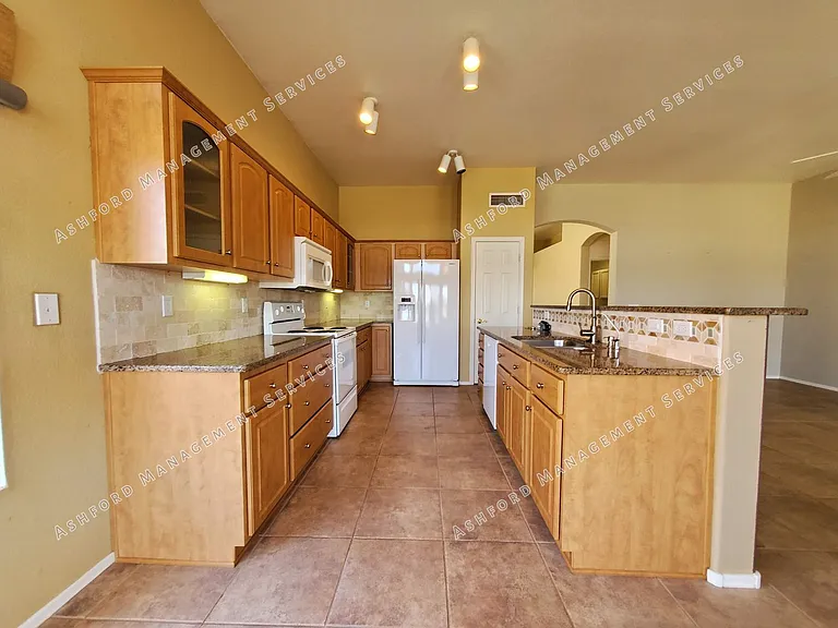 11558 W Tortoise Ct — Photo 19