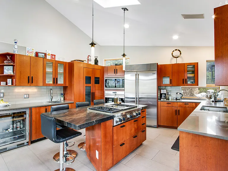 Gourmet kitchen with Wolf oven and range and Sub Zero refrigerator