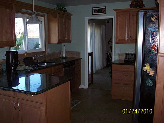Granite, stone, & SS kitchen