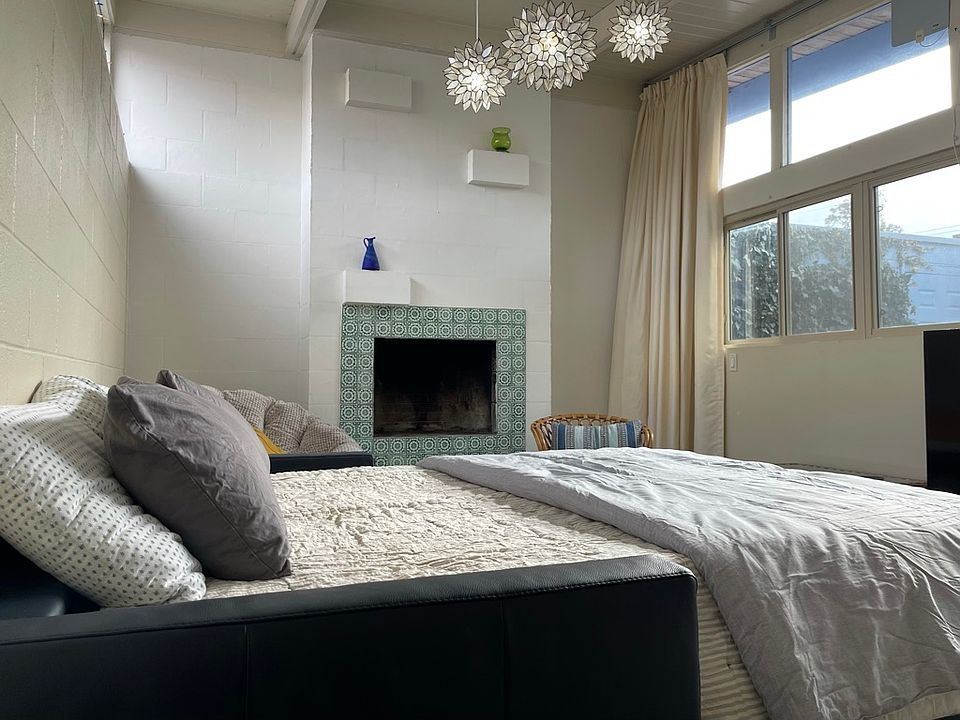 Living room with queen sleeper sofa bed ready for use.
