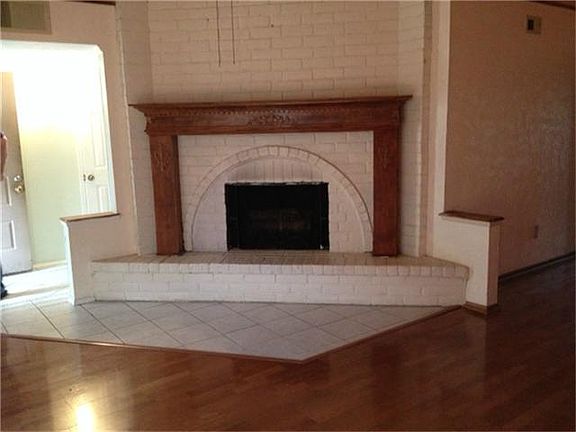 Wood Floors and Fireplace make the Living Area Warm and Inviting!