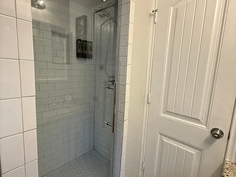 Full Bathroom 2 - walk-in shower & bathroom essentials.