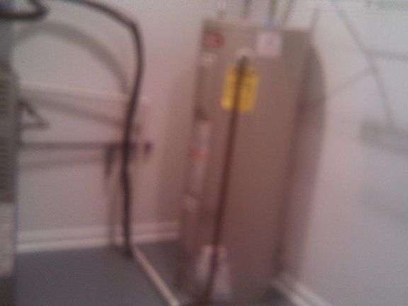 Utilities closet washer/dryer hook up