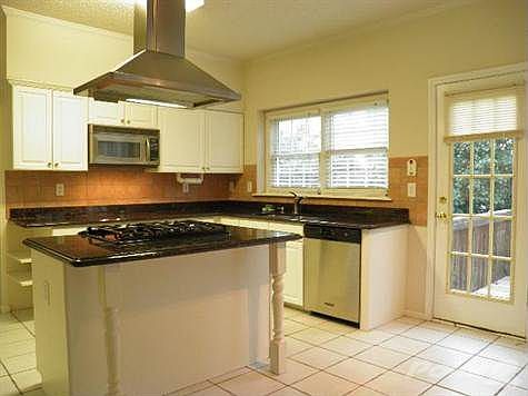 Kitchen with Granite top and view to family room