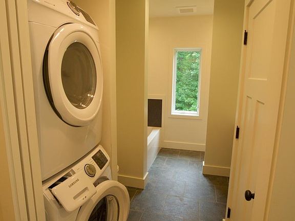 Master bathroom has a huge soaker bathtub and a separate spacious shower. Also washer dryer and large linen closet