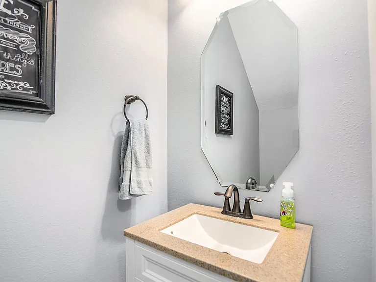 Guest-friendly half bath conveniently located on the first floor