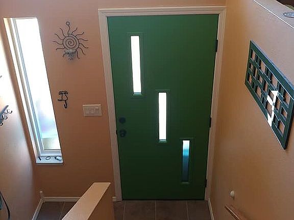 Tiled entry,new door, window