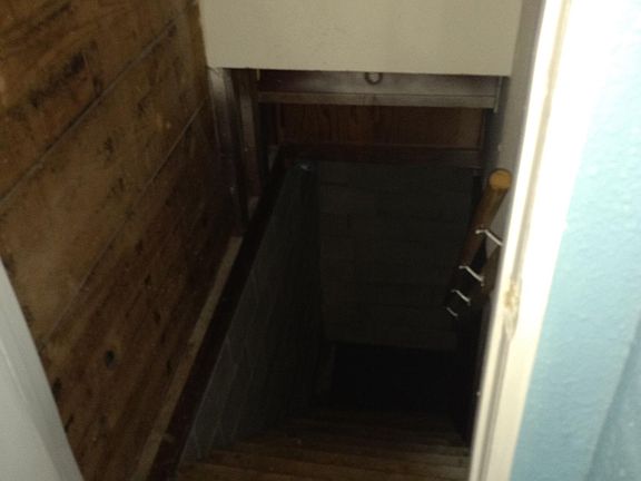 Doored basement stairs