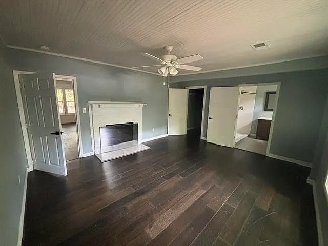 Walk-in Master closet and doorway to MBth