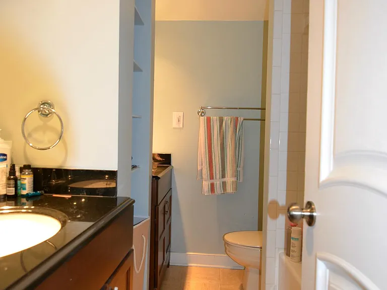Hallway leading to bedrooms and bathroom