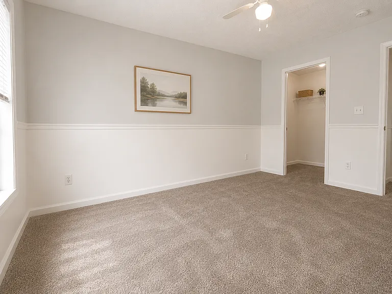 Beautifully refreshed duplex in Phenix City offering central AC, durable LVP flooring, modern finishes, spacious bedrooms, updated kitchen appliances, and a clean contemporary feel throughout.