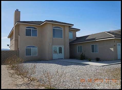 3,408sf home built in 2009, 6 bedrooms, 4 baths, multi car tandem car garage, on a 14,948sf lot.  Back yard is enclosed with a block wall feature.  Water Views and Mountain Views too! W O W !!  All for only $293,000.  We are talking $85.97sf here.