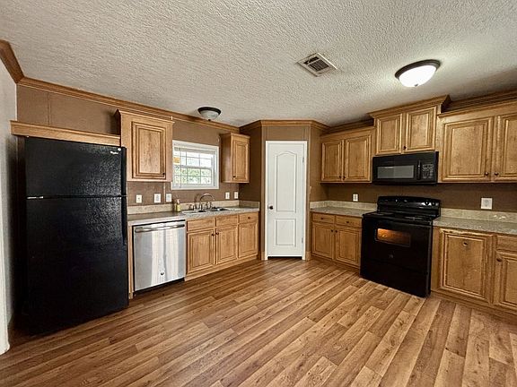 5th image of 2555 Pga Blvd Lot 208