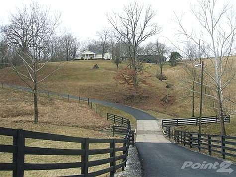 Image this view to coming home every day.   Crossing the bridge over the creek.  This farm has all the things we all want in a farm. Totally up to date home, large barn that can hold all of your equipment, and animals with  4 horse stalls with water and electric. 2 fishing ponds fully stocked, Picnic shelter, fire pit, horse shoes. Then we get to the farm,with fenced pastures, plenty of hay, and plenty of woods to hunt an play in when the work is done. If you were to build your own private get away this would be it. This is still less than an hour commute to Cincinnati or Louisville. This saves you the work you would have to do to make most farms ready to use, and you can decide what you want to use it for.