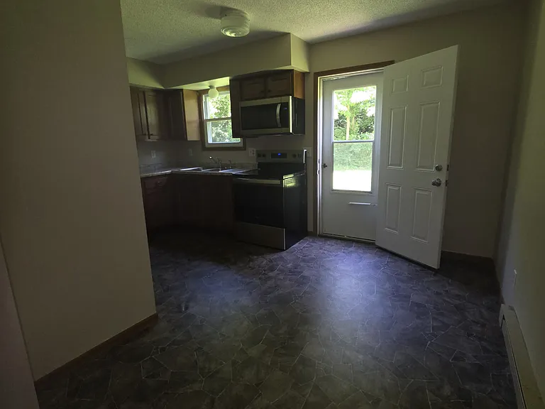 Kitchen with view of the backyard