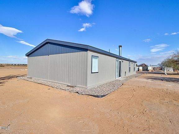 5th image of 10991 W HILLTOP Drive