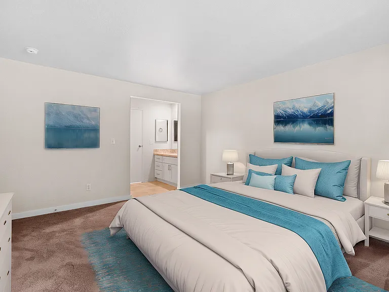 Experience comfort and style in this beautifully designed bedroom, perfect for relaxation.