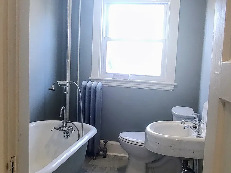 Bathroom with charming clawfoot tub.