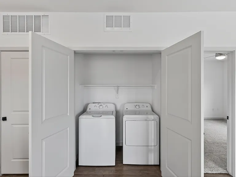 Simplify your routine with a washer and dryer inside your home.
