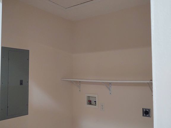 Laundry room w/hook-ups for washer & dryer