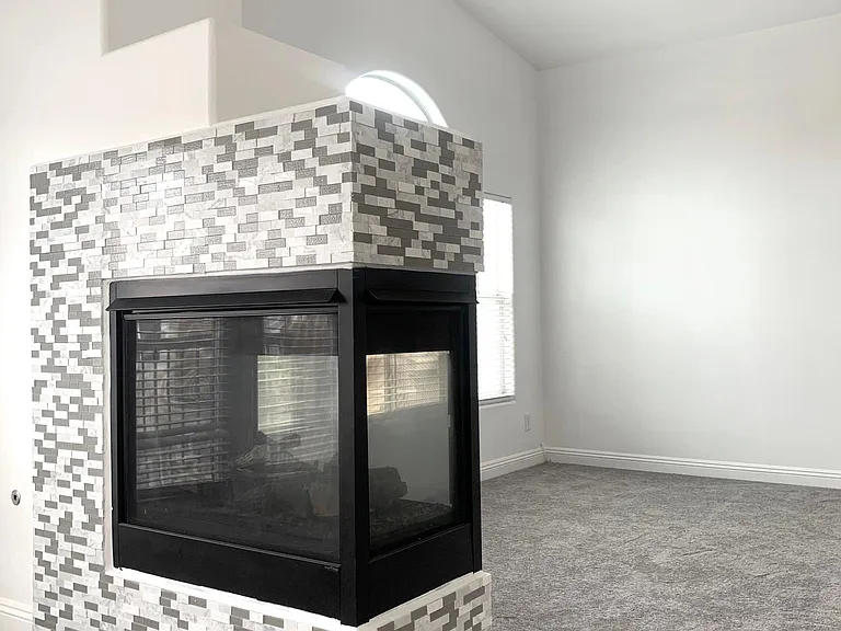 Custom fireplace and ceiling fans