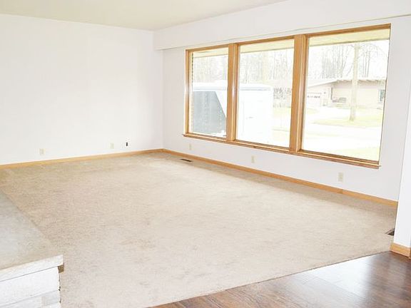 The living room has picture windows that really lets the light in.