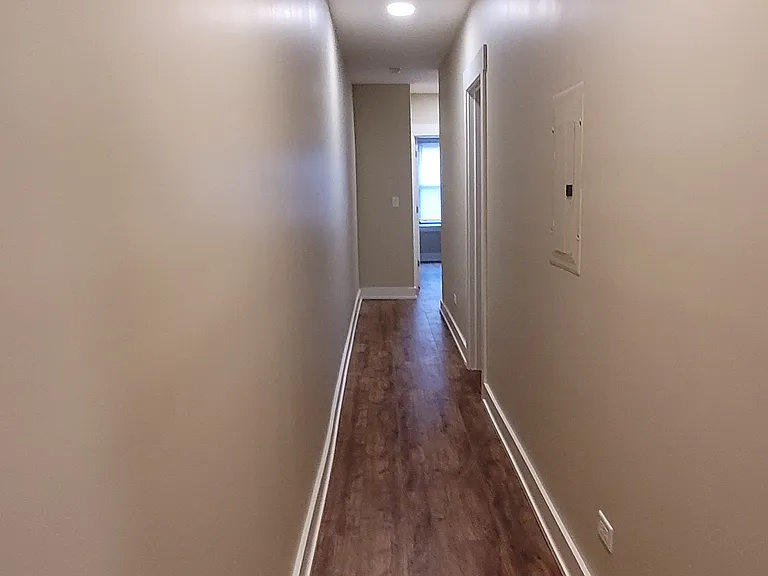 Bedrooms are removed from the Living Room and Kitchen.