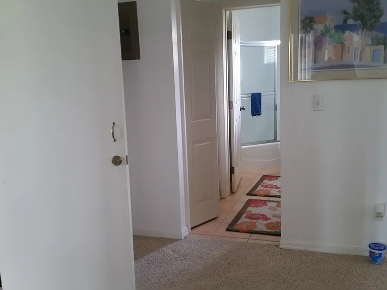 View form LR to bathroom, connected by kitchenette