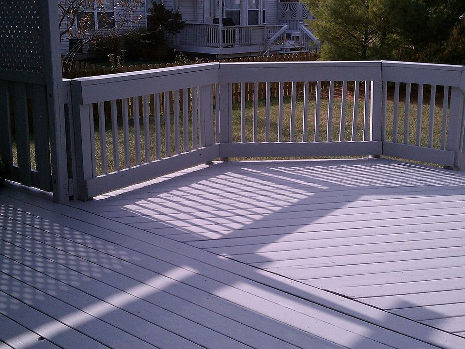 HUGE Deck opens to one of the largest yards in the area.