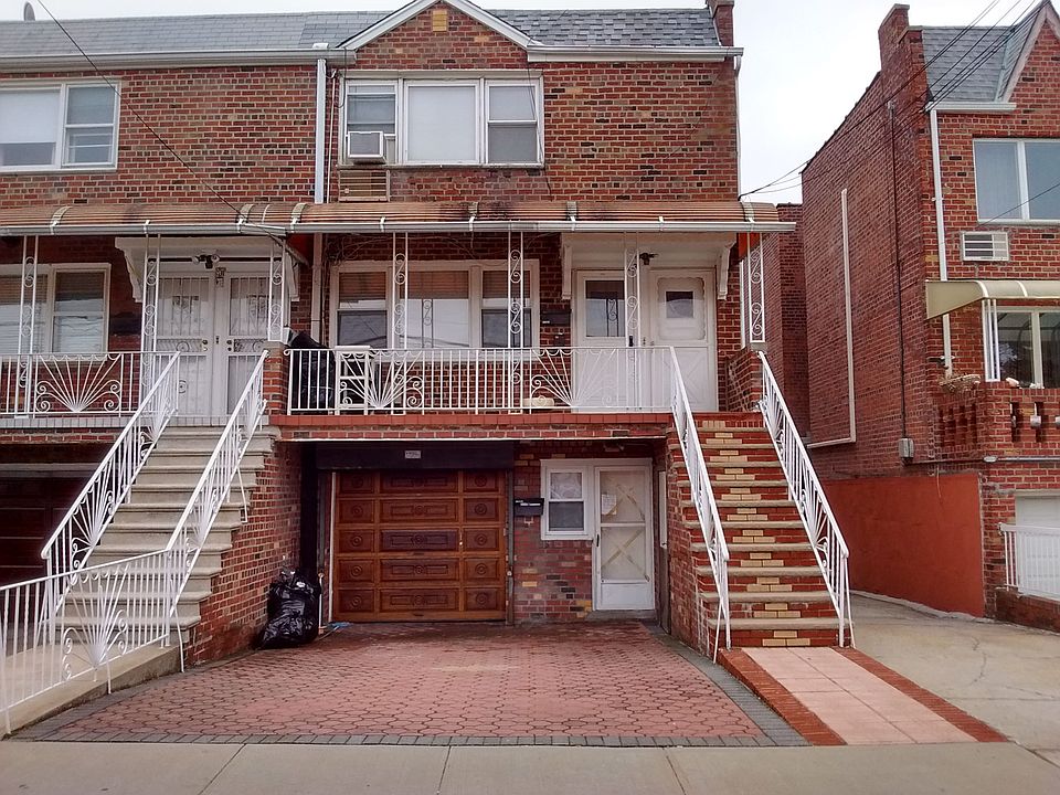Brick Three Family Home Fron