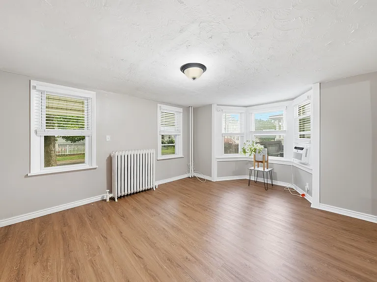 View of Entire Living Room Facing Front of Home