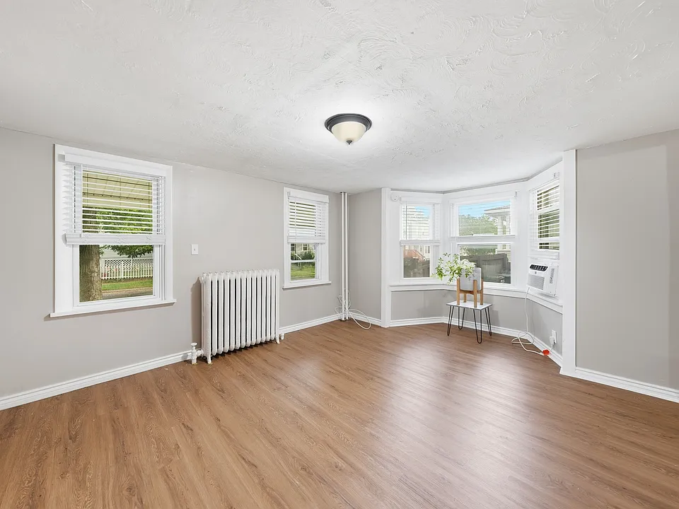 View of Entire Living Room Facing Front of Home