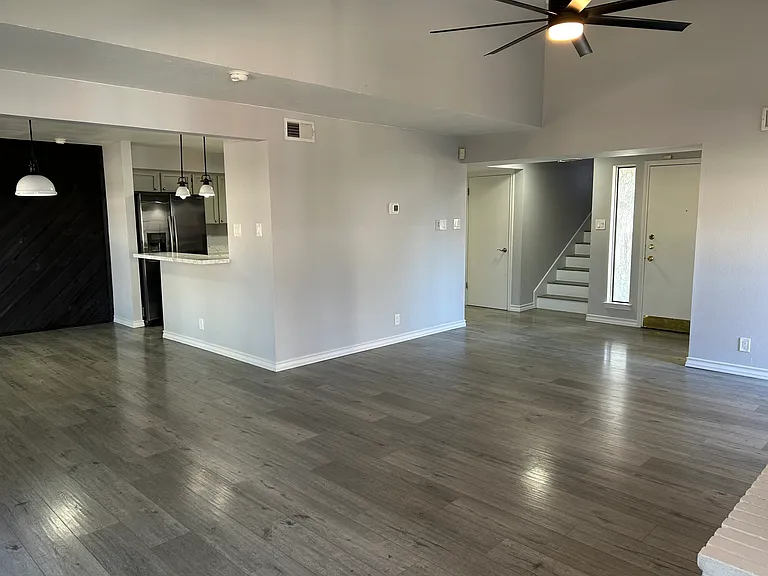 Now you can see the that the kitchen is literally center of this home you can walk over to the dining area through the kitchen into the breakfast room and back around to the living room.