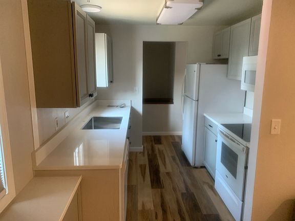 Newly remodeled kitchen, quartz counters, new appliances & cabinets.