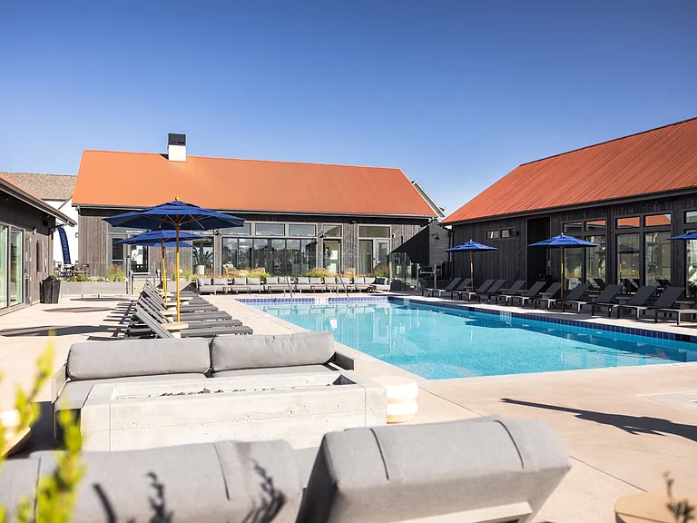 Poolside patio with fireside lounge seating