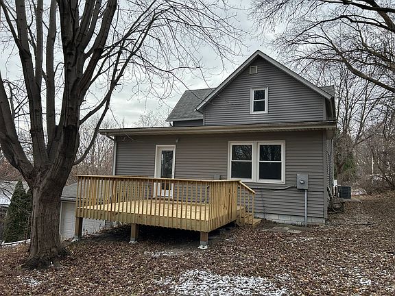 Back of house with great deck for entertaining and spacious yard