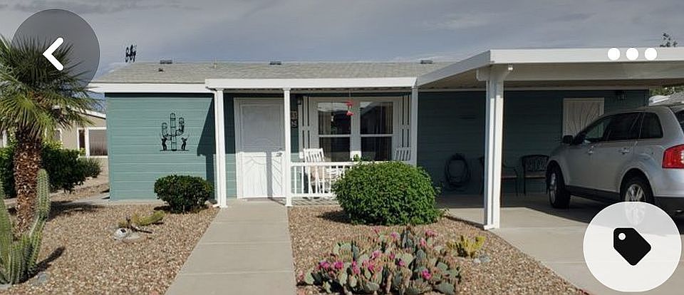 Entry, carport with sunshades