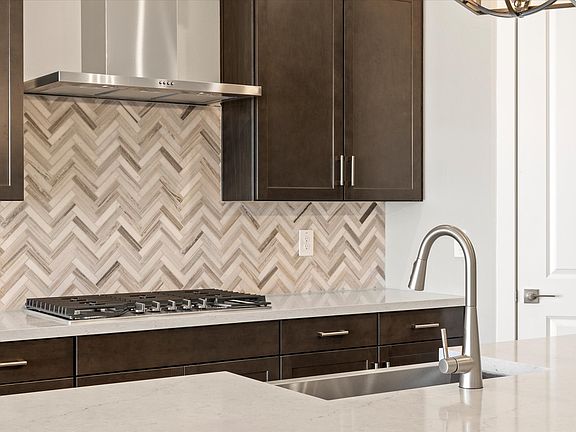The Arlo floorplan image taken at Abel Ranch featuring a gourmet kitchen.