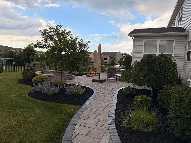 WALK WAY FROM THE ARKING GARAGE TO FENCED BACKYARD