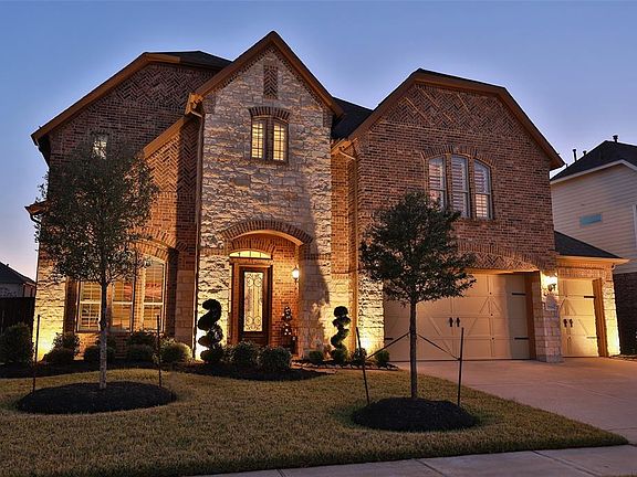 This home is picture perfect at dusk.