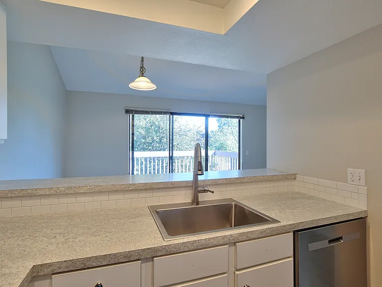 Stainless steel sink with pot filler faucet