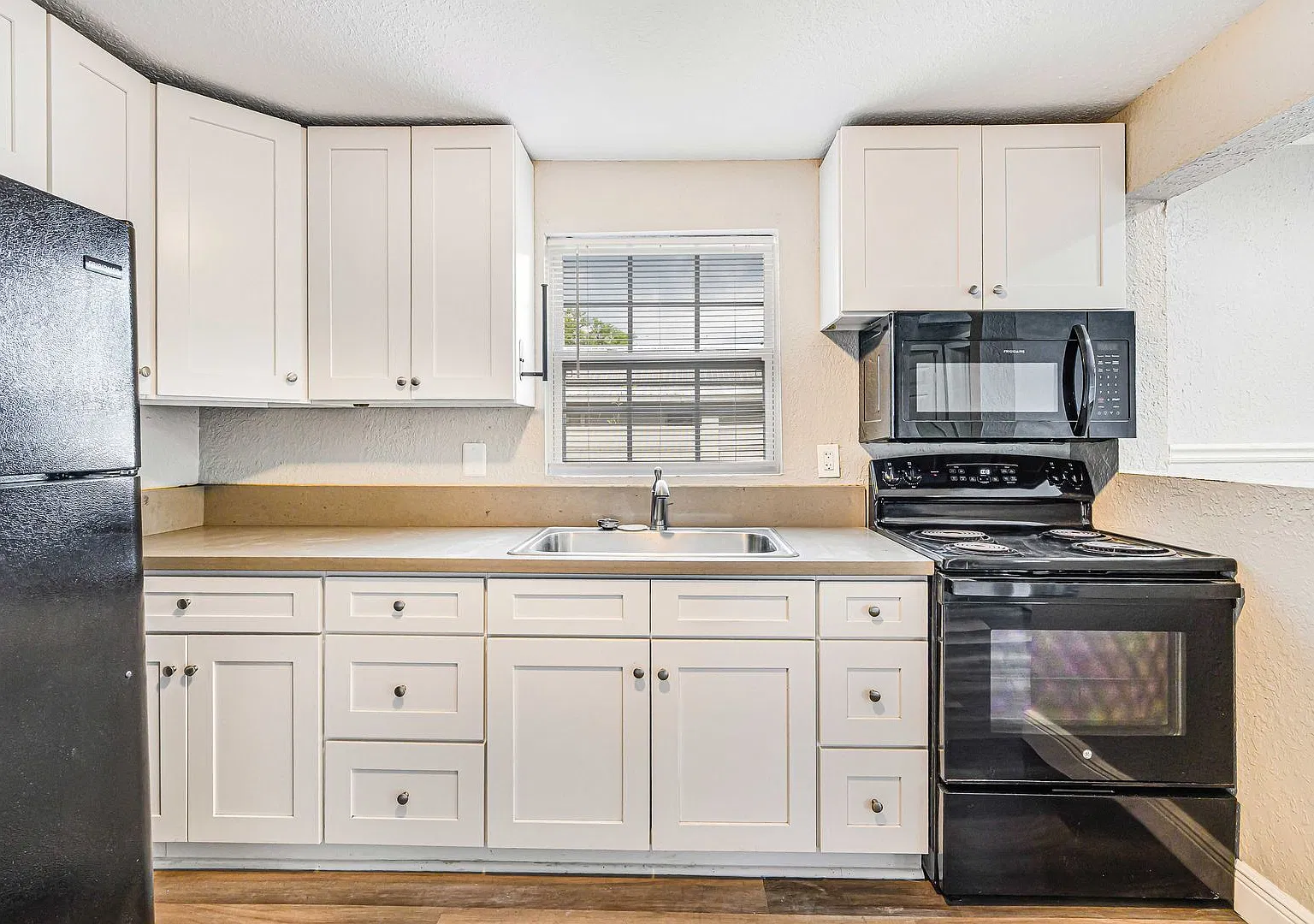 Charming 3-Bedroom Home with Renovated Interior & Large Fenced Backyard Pet Friendly! — Photo 2