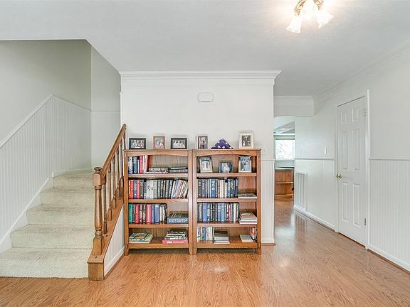 A spacious entry greats guests as they enter the home.