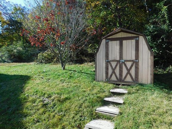 exterior rear; lawn shed in rear