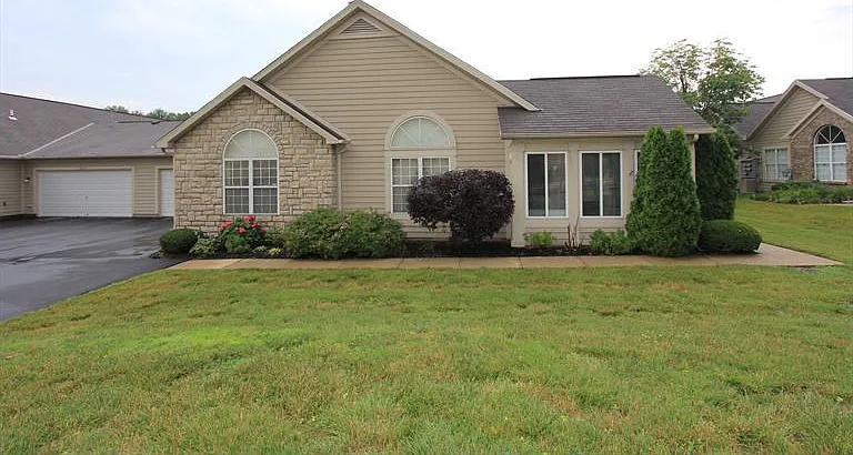 Exterior with attached 2 car garage
