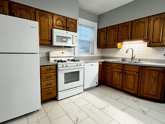 Kitchen can fit small table with a couple of chairs if desired
