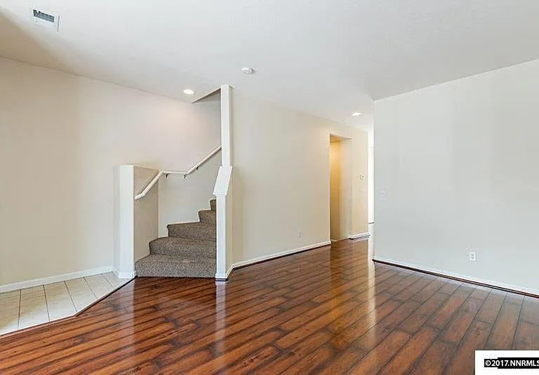 Living Room with stairs going up the Bedrooms
