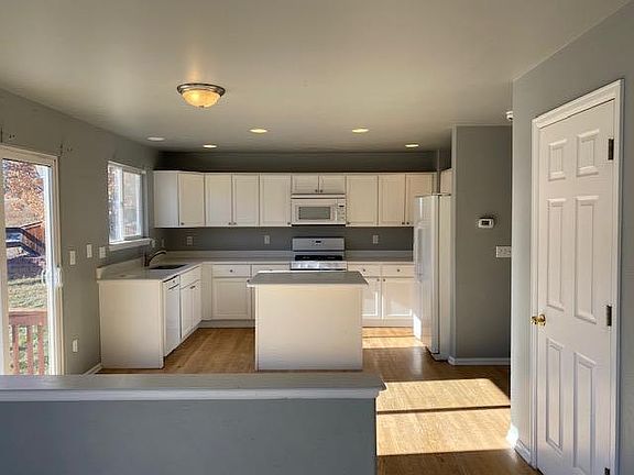Kitchen features newer cabinetry with Granite countertops